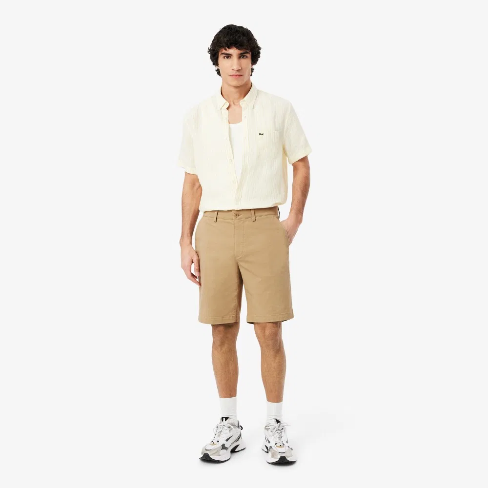 Мужские твиловые шорты-чиносы бермуды бежевые от Lacoste