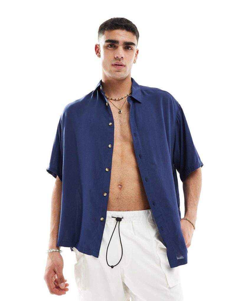 

Темно-синяя рубашка оверсайз из вискозы ASOS DESIGN