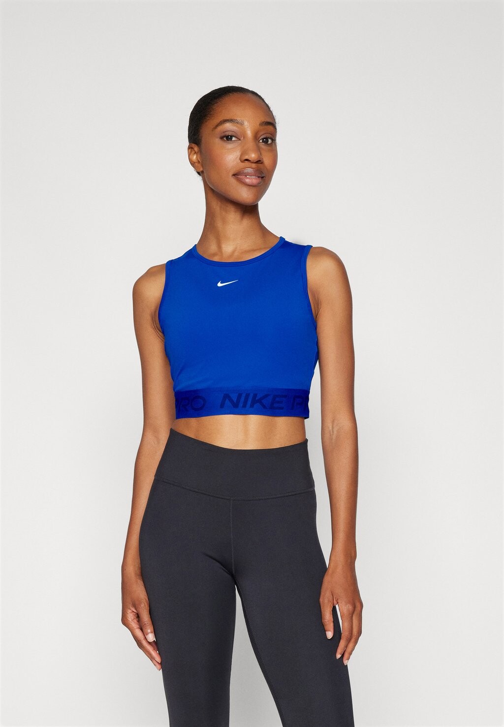 

Топ PRO CROP TANK Nike, синий