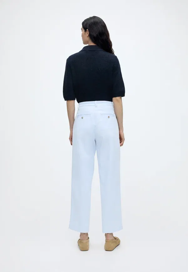 Брюки чинос Tommy Hilfiger Slim Straight Chino, цвет светло-голубой — фото 3
