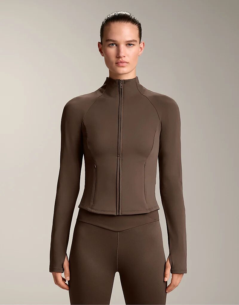 

Легкая теплая куртка OYSHO коричневого цвета