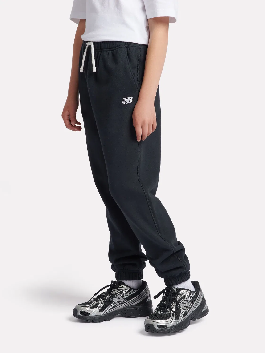 Джоггеры на флисе French Terry New Balance, черный — фото 2