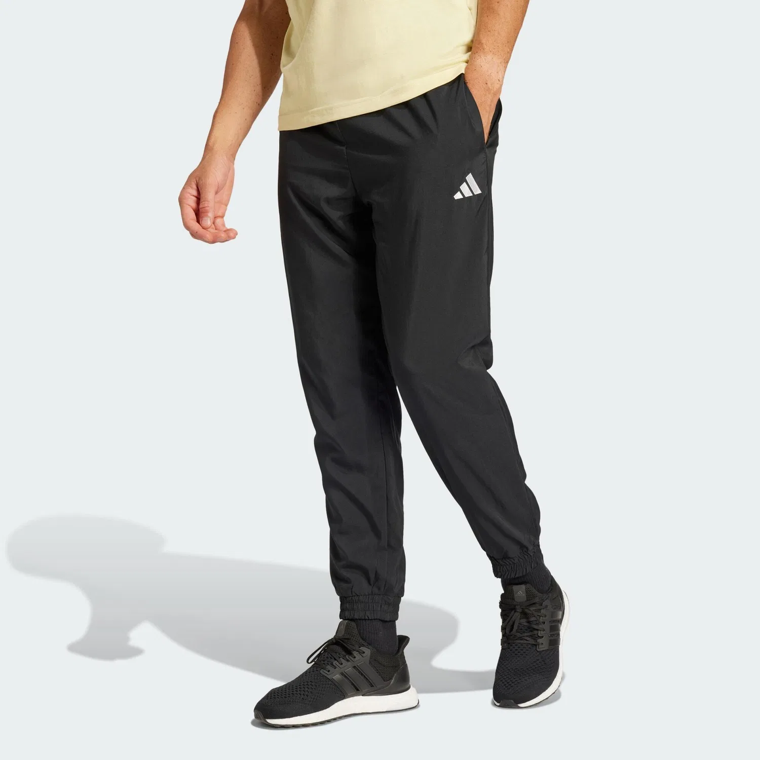 Мужские спортивные штаны с принтом Essentials Kleines Logo Stanford Adidas, Schwarz / Weiss