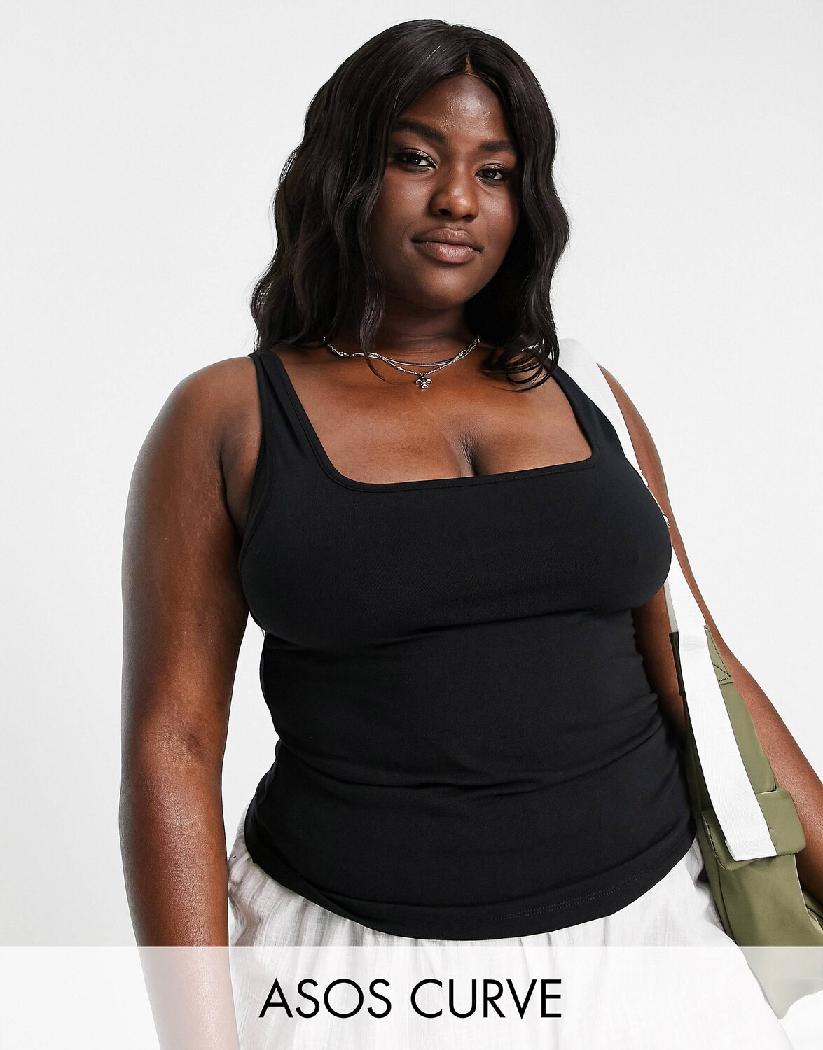 

Черный жилет с вырезами спереди и сзади ASOS DESIGN Curve