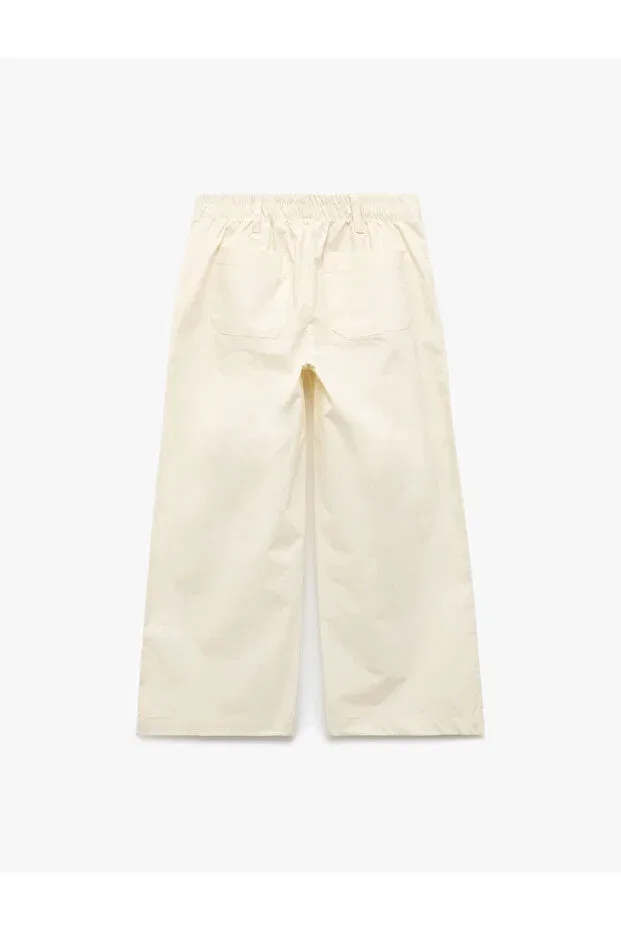 Детские брюки для девочек широкие плиссированные Cotton Pleated Wide Leg Trousers with Pocket Detail Koton, Ecru — фото 2