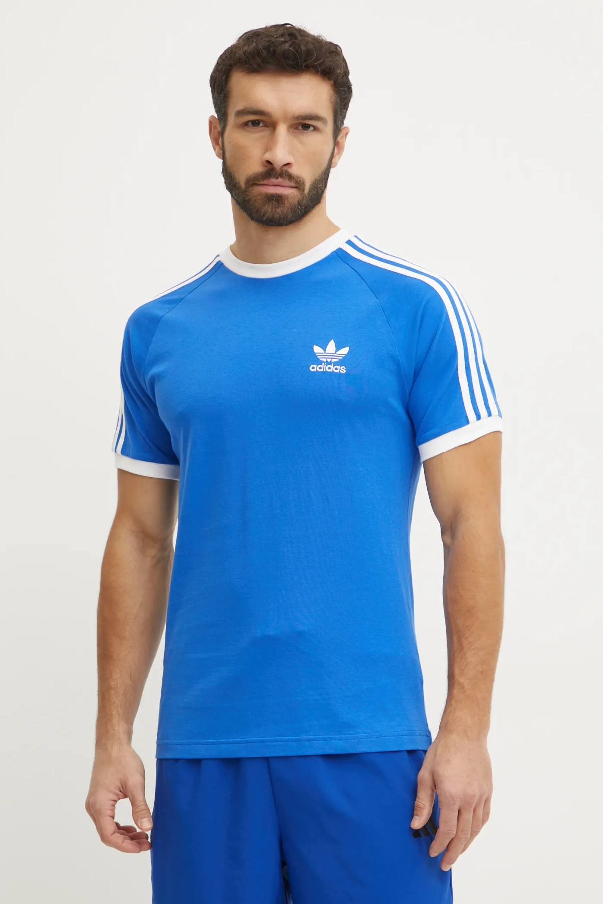

Хлопковая футболка с 3 полосками adidas Originals, фиолетовый