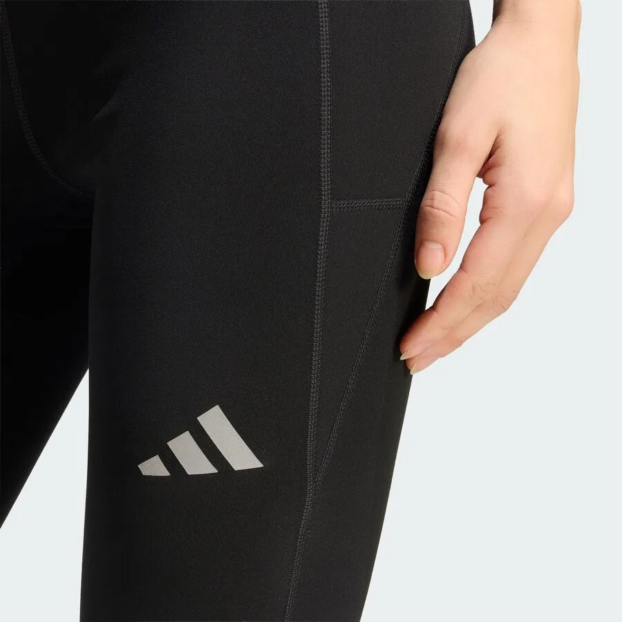 Спортивные брюки-скинни ADIDAS PERFORMANCE 'Essentials Winterized' черного цвета — фото 3