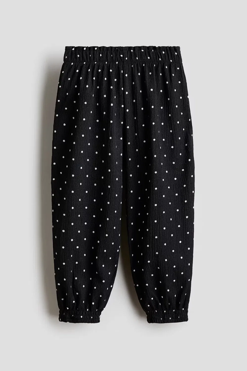 Брюки из фактурного трикотажа H&M, Schwarz/Gepunktet