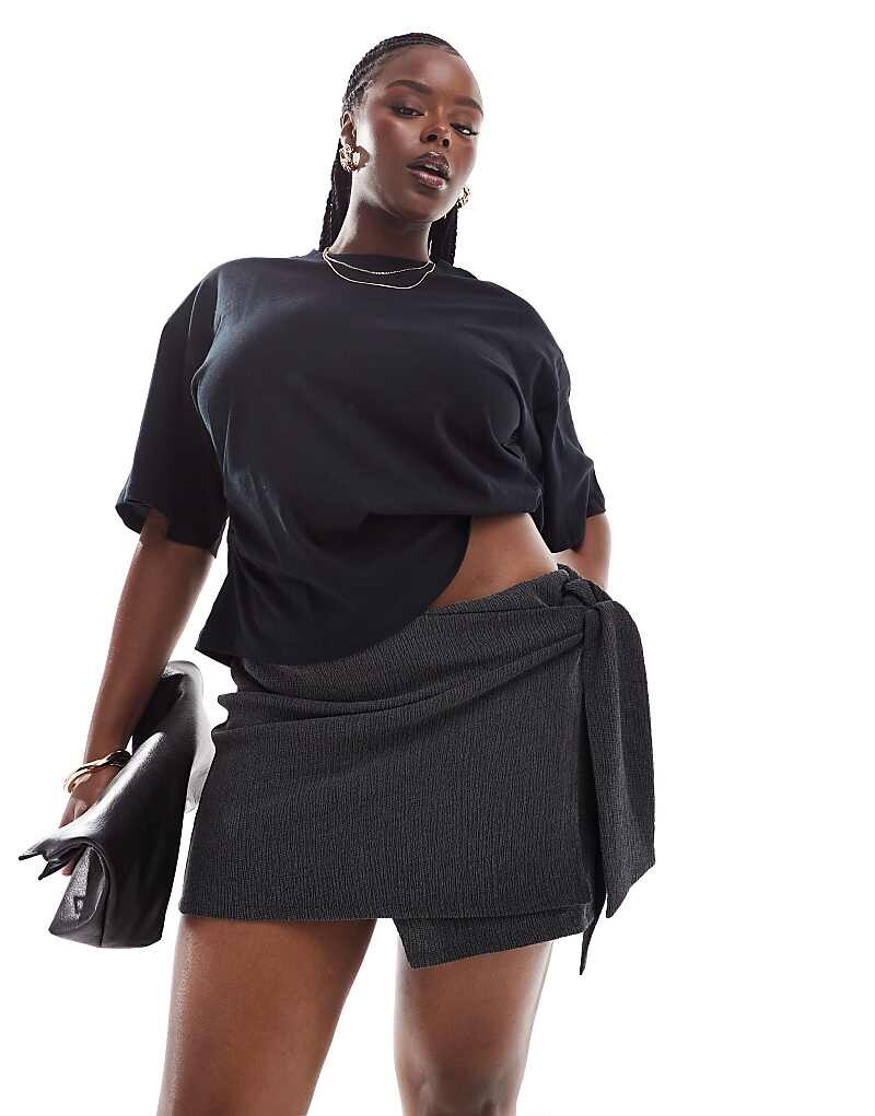 

Черная фактурная мини-юбка с завязками ASOS DESIGN Curve
