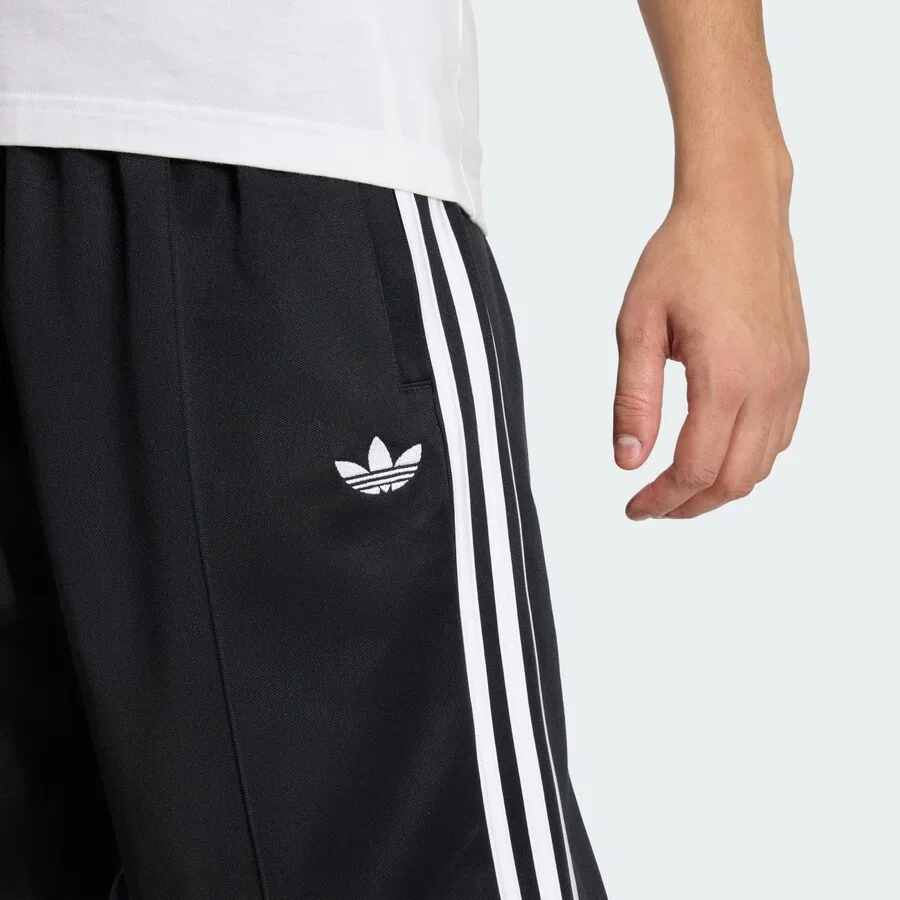 Спортивные брюки свободного кроя ADIDAS ORIGINALS черного цвета — фото 4