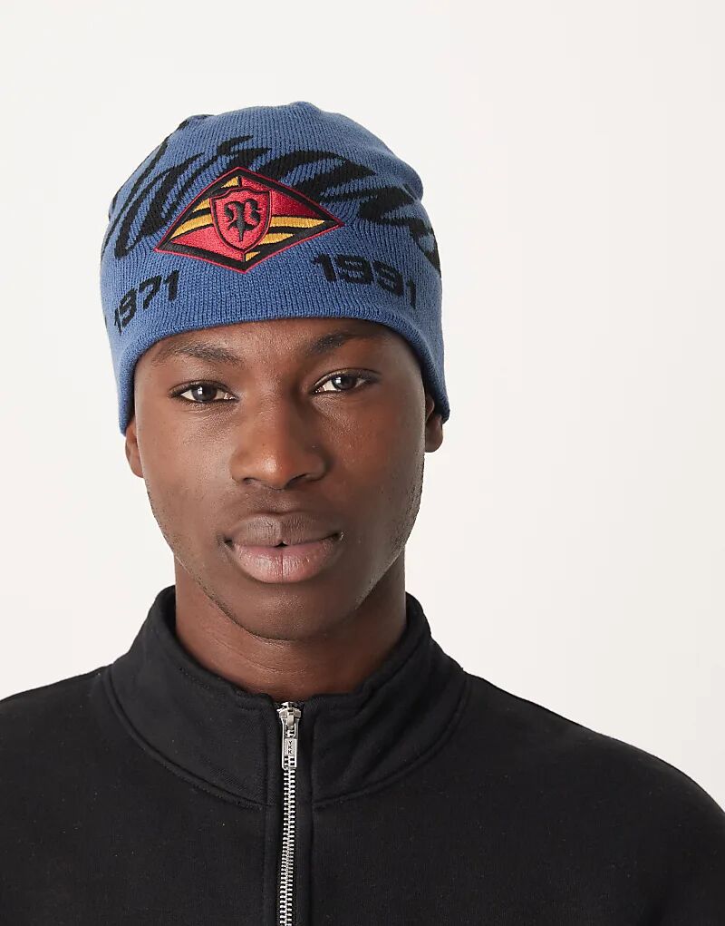 

Темно-синяя вязаная шапка с изображением черепа ASOS DESIGN Paraiso