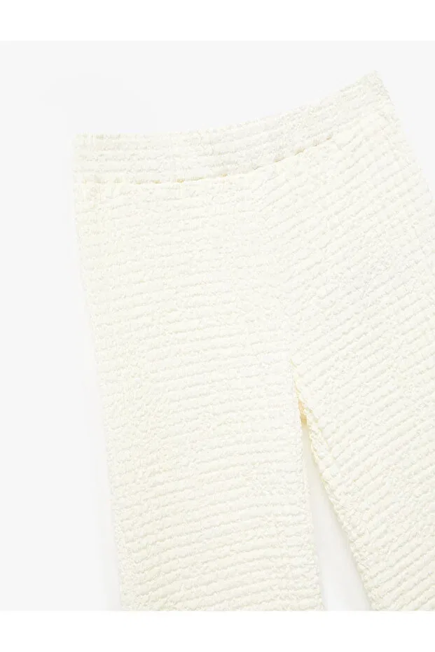 Детские брюки для девочек с принтом Textured Spanish Leg Trousers with Elastic Waist Koton, Ecru — фото 3