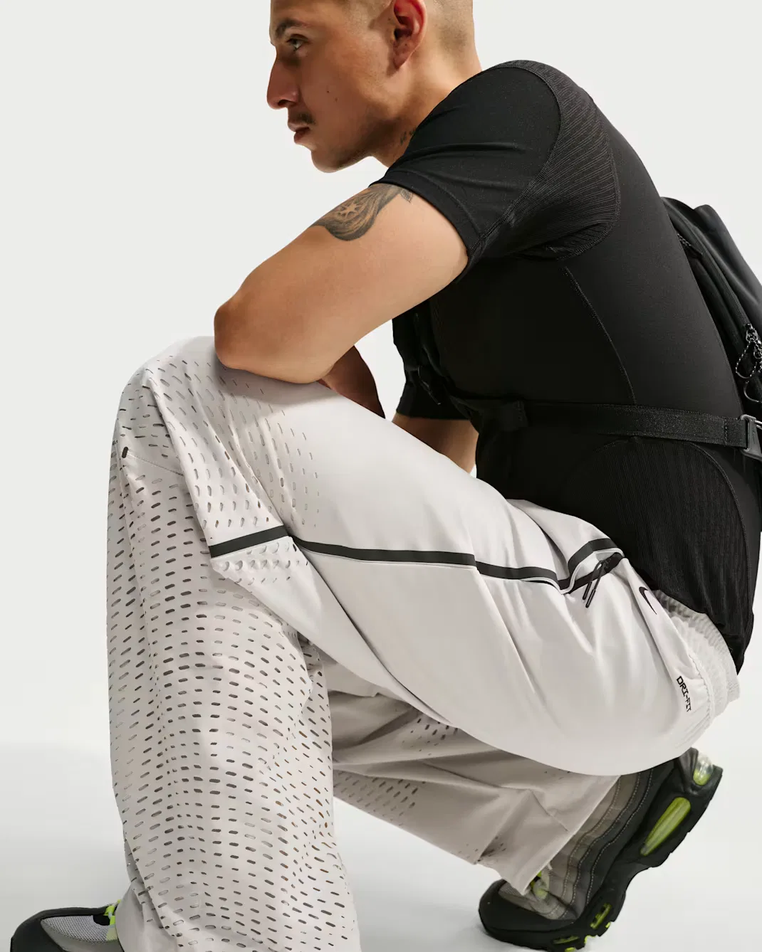 Мужские брюки Dri-FIT Shori Knit с открытым низом Nike Tech, Light Bone/Black — фото 4