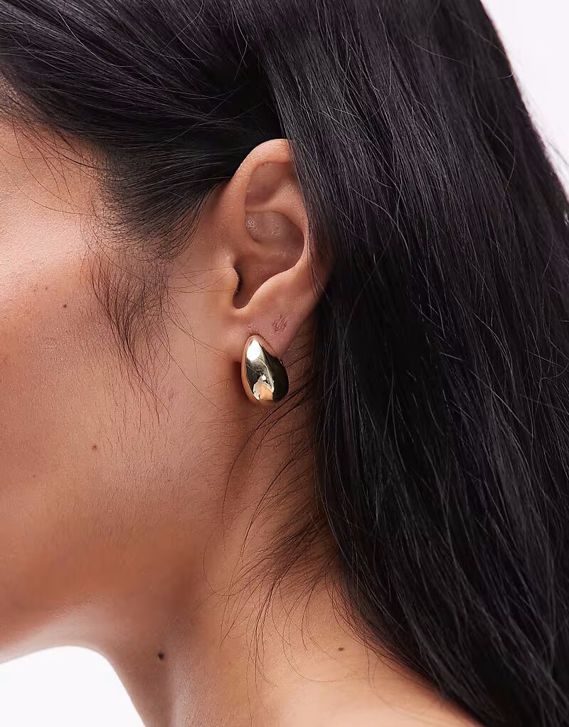 

Серьги округлой формы из латуни с золотым плетением Arket