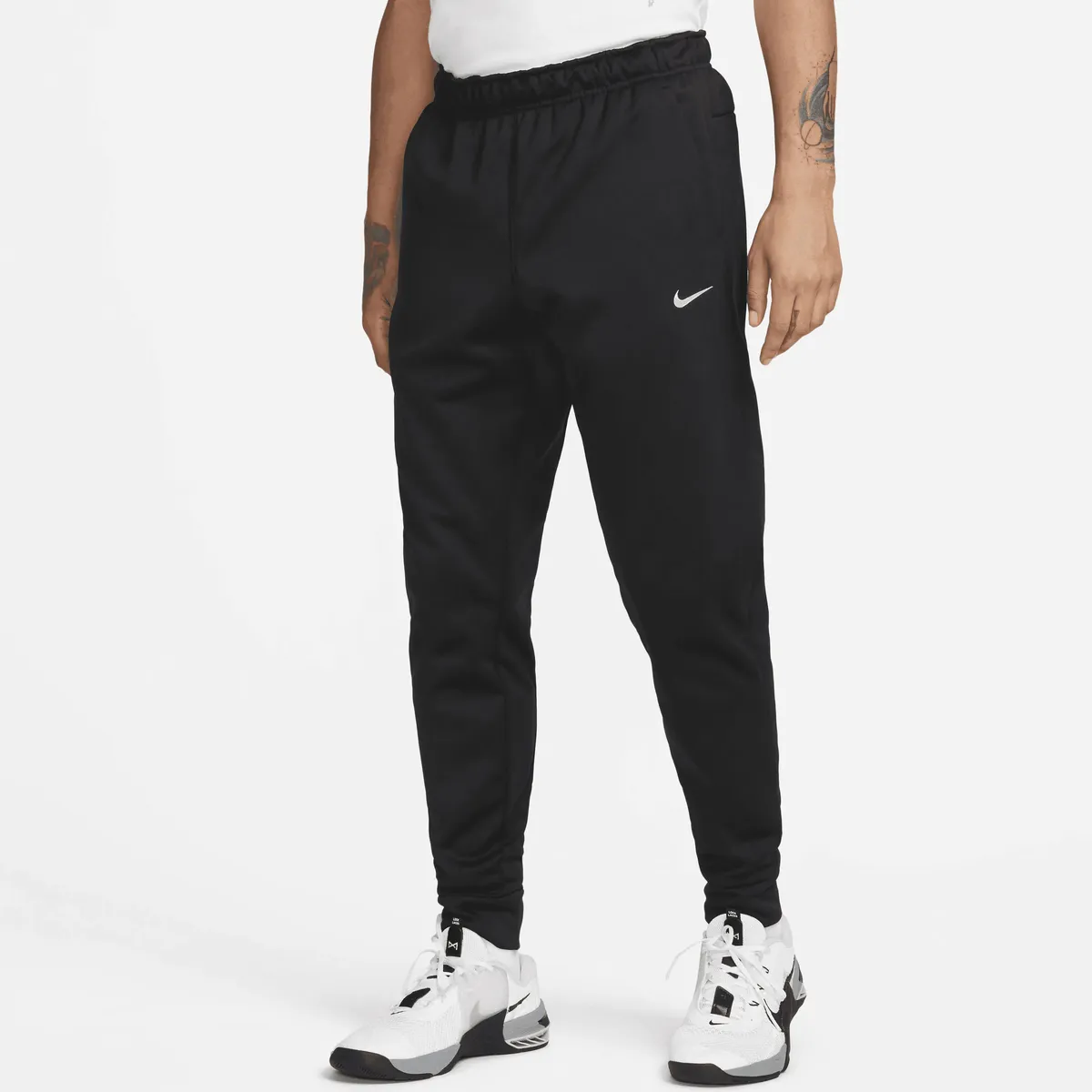 

Спортивные брюки Nike "Therma-FIT Men's Tapered Fitness Pants", белый
