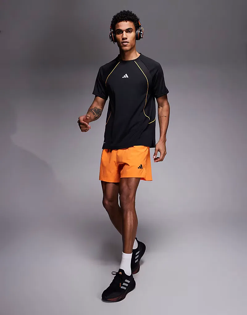 Тренировочная футболка Adidas Climacool в черно-оранжевом цвете — фото 2