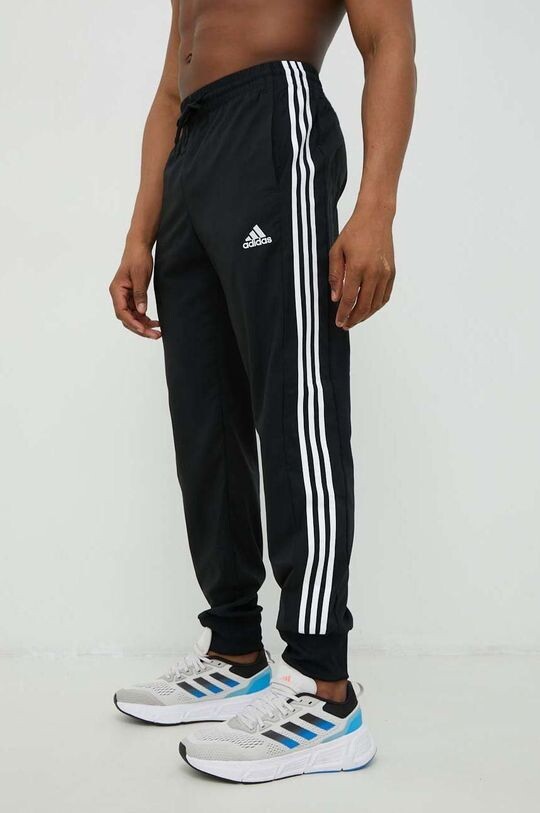

Тренировочные штаны adidas, черный