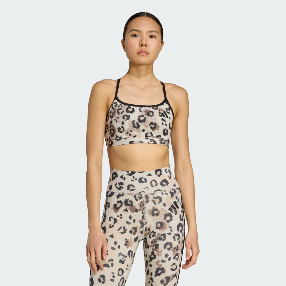 

Спортивный бюстгальтер Adidas Powerreact Essentials Light Support Bra Print, цвет Beige/Black
