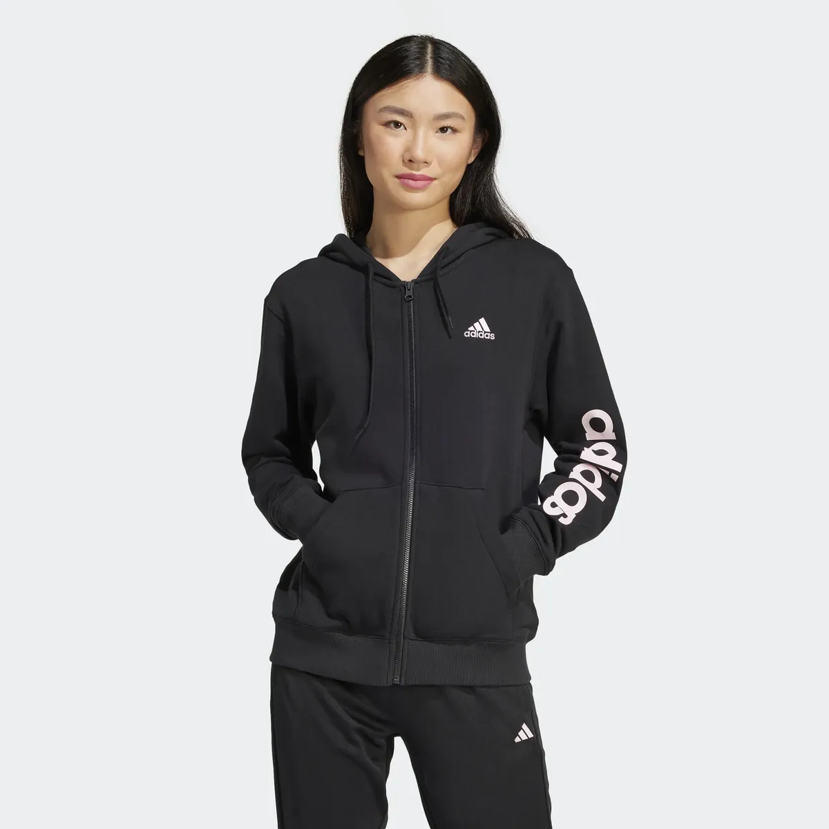 

Adidas Sportswear толстовка с капюшоном "ESSENTIALS LINEAR FRENCH TERRY HOODED JACKET", цвет Black / Clear Pink