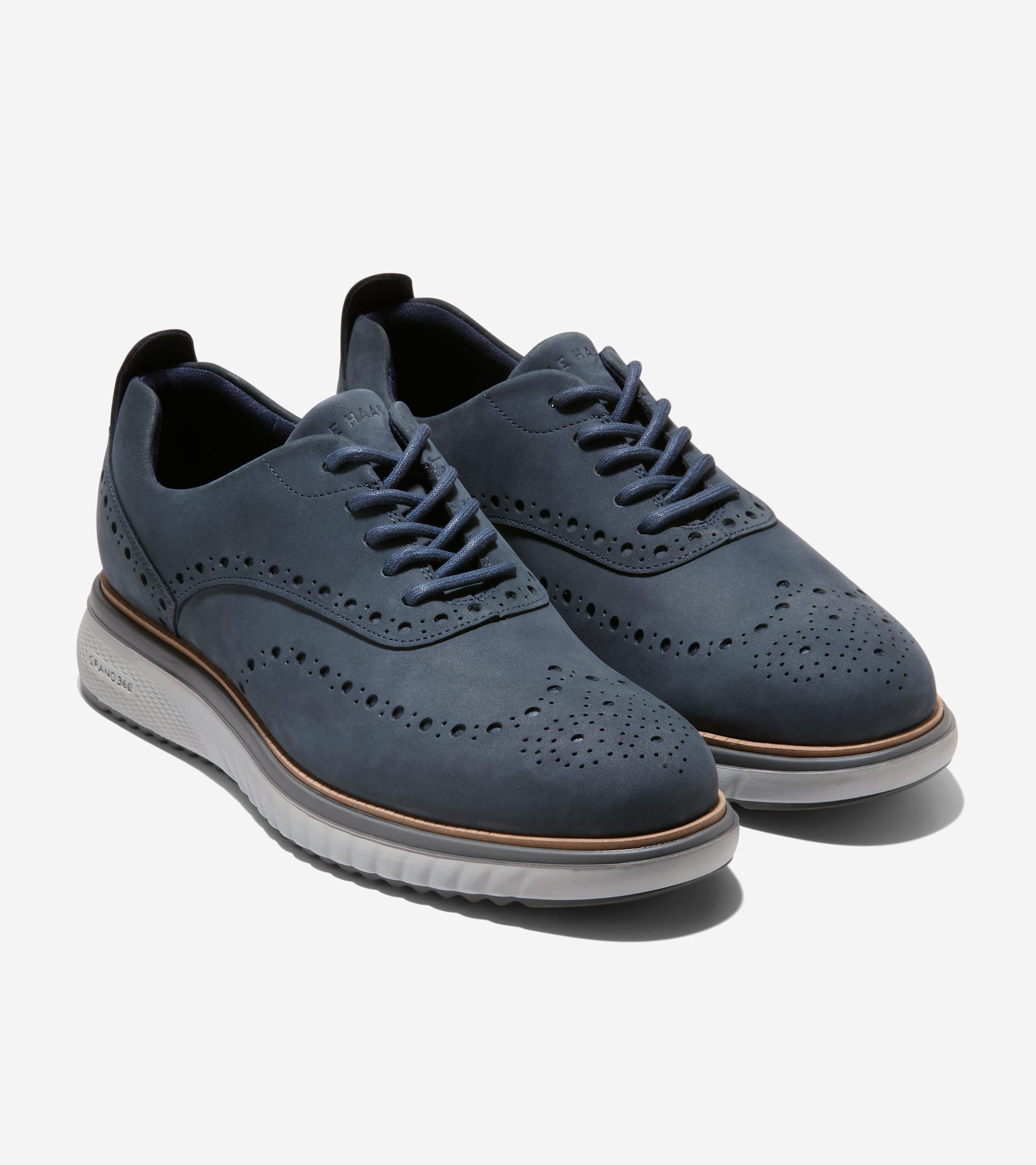 

Cole Haan Мужские оксфорды Zerogrand Eon Wingtip, темно-синий