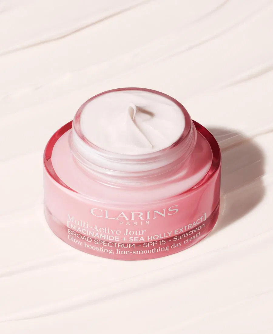 Сыворотка Clarins — Многофункциональный дневной увлажняющий с SPF 15 для сужения пор и придания сияния коже, 48 г — фото 4