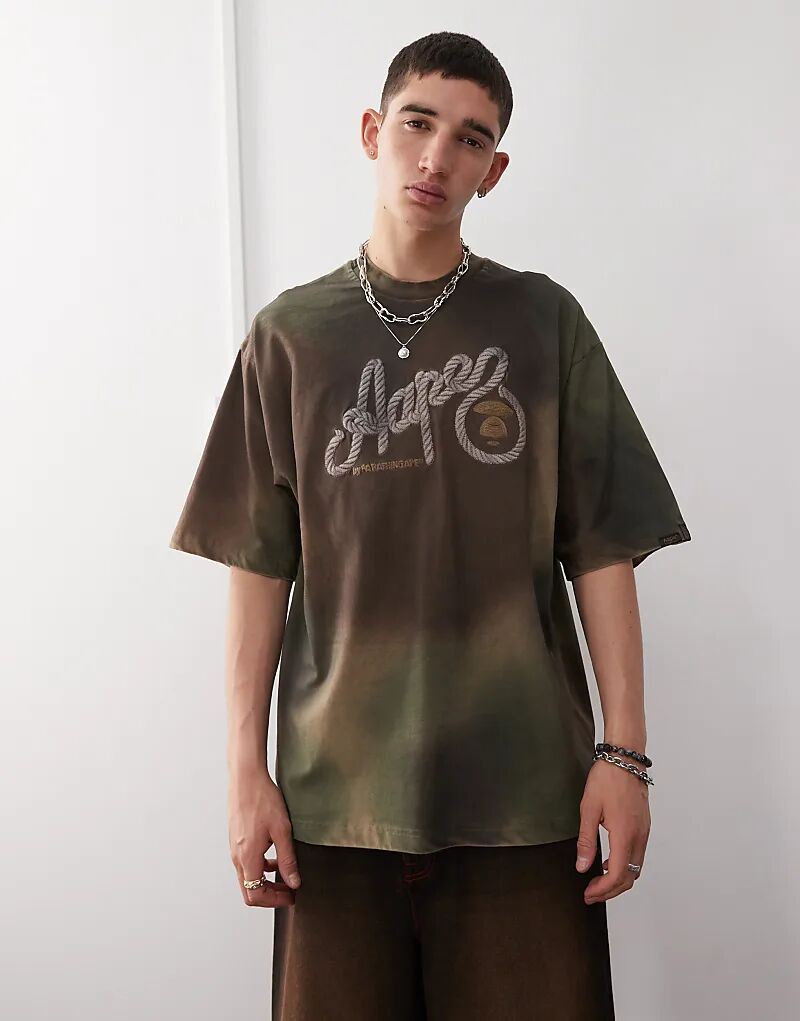 

Футболка камуфляжная Aape By A Bathing Ape зеленого цвета Aape By A Bathing Ape
