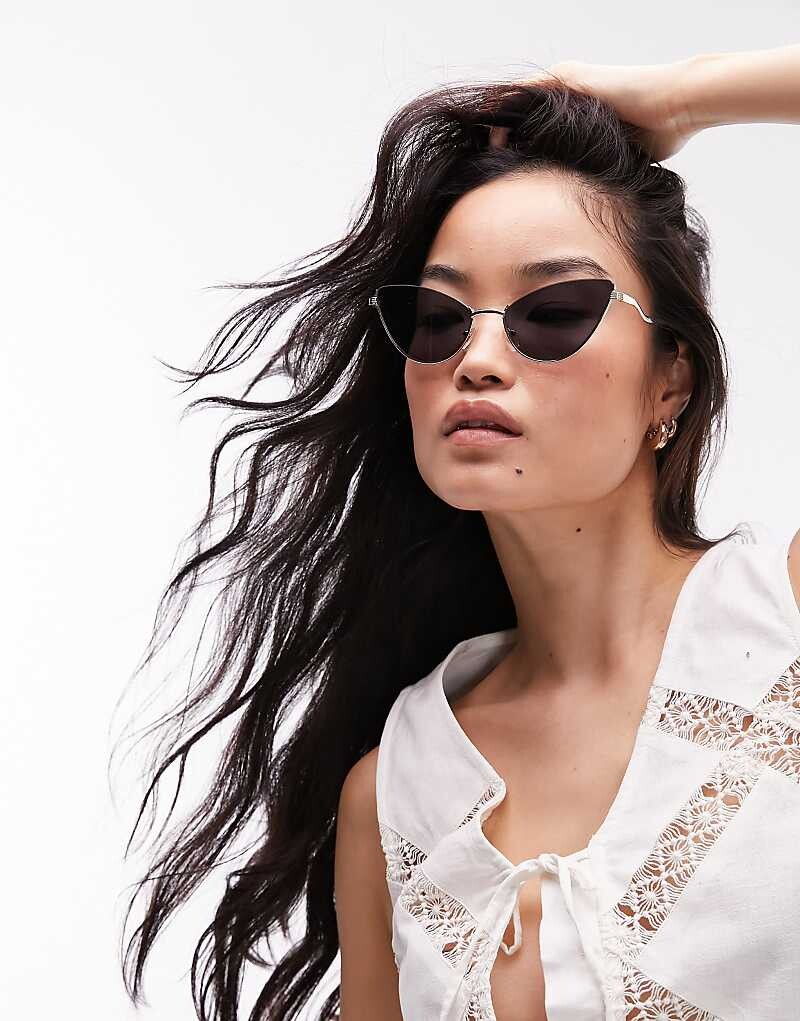 

Topshop – Hibiscus – Солнцезащитные очки «кошачий глаз» без оправы (золотые)