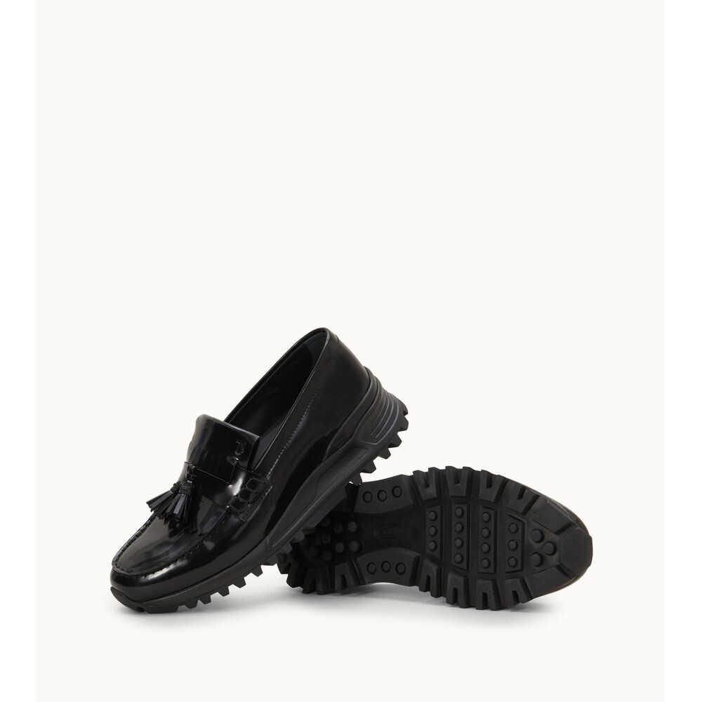 

Лоферы из блестящей кожи TOD's, черный