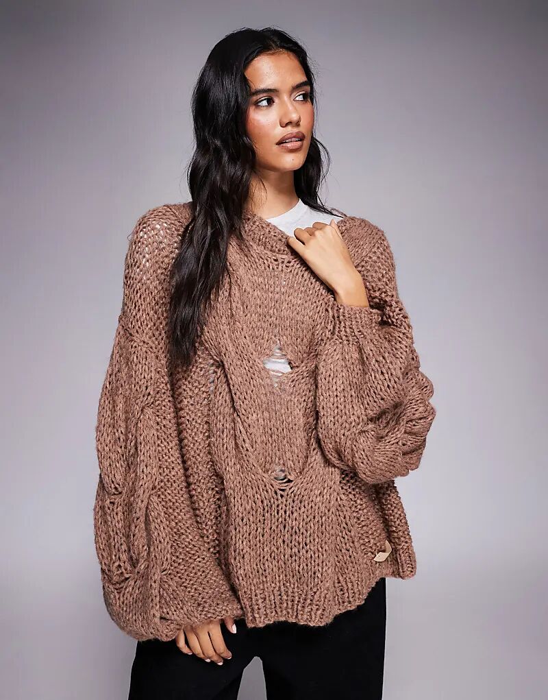 

Kiwi & Co Daydream содержит шерстяной вязаный вручную объемный джемпер с объемными рукавами и отделкой косами цвета мокко