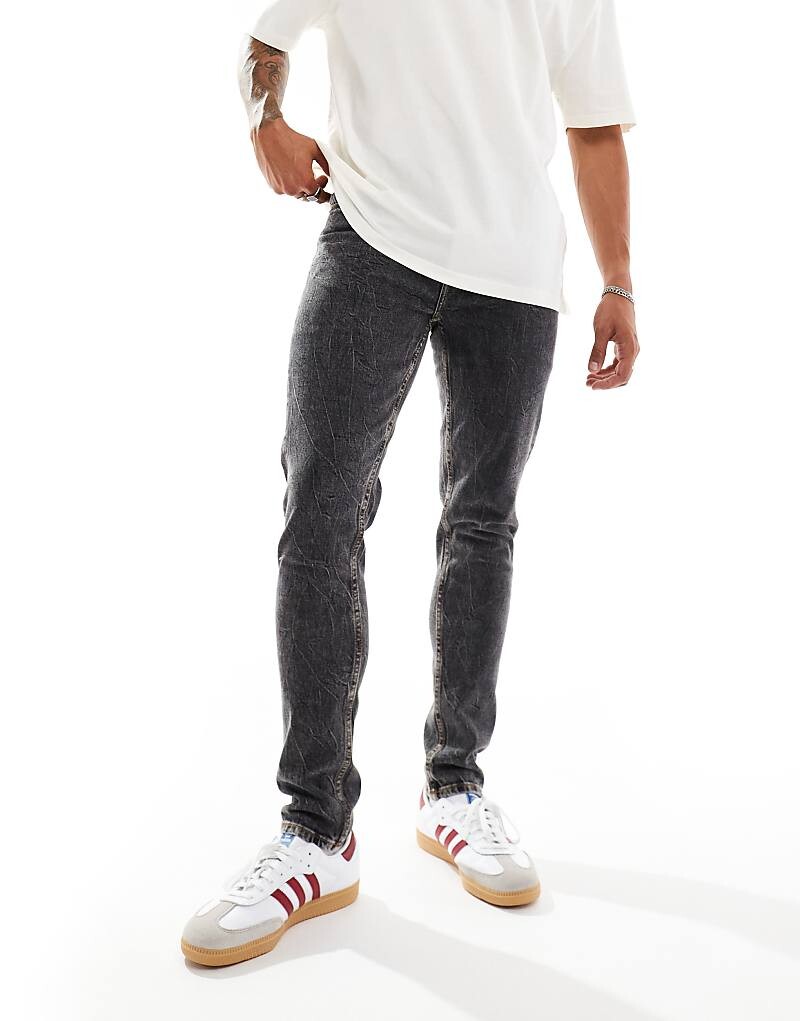 

Черные постиранные джинсы скинни ASOS DESIGN
