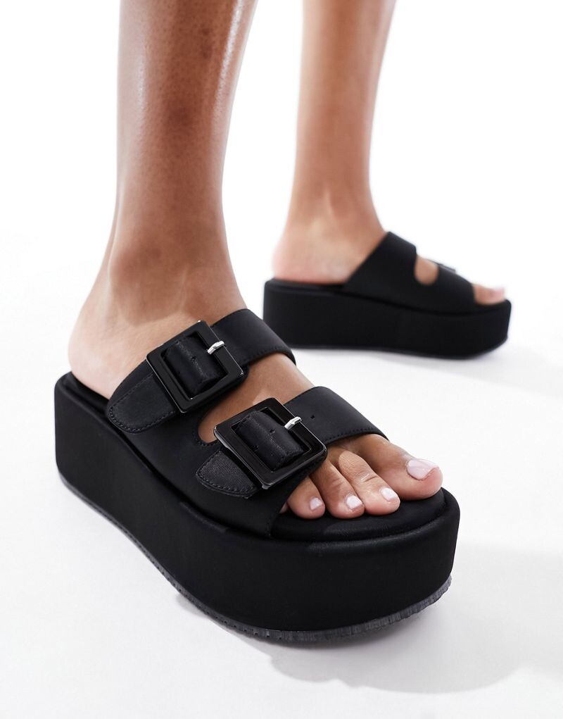 

Черные сандалии на платформе с пряжками ASOS DESIGN Taxon