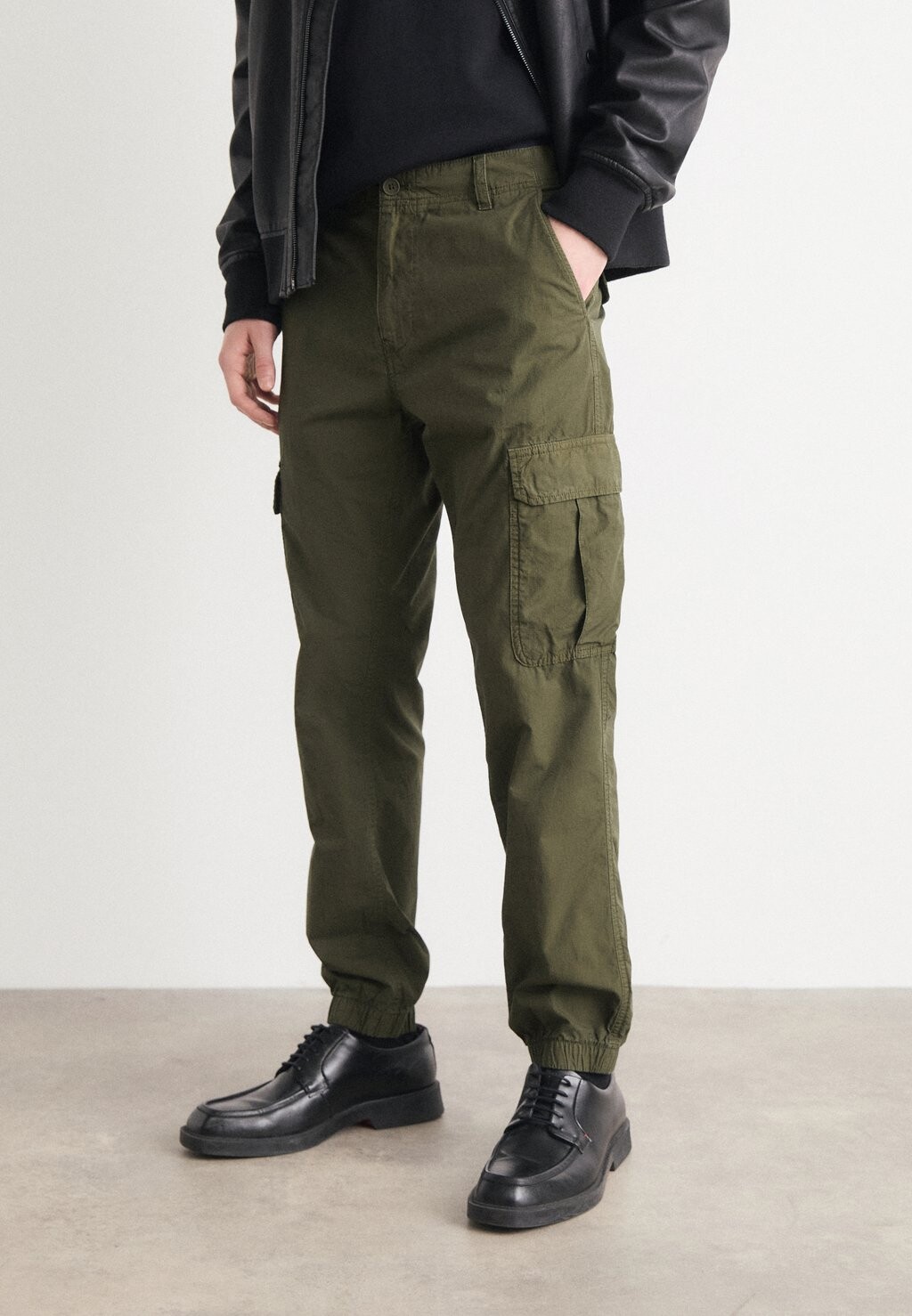

Брюки-карго ETHAN Tommy Hilfiger, темно-зеленый