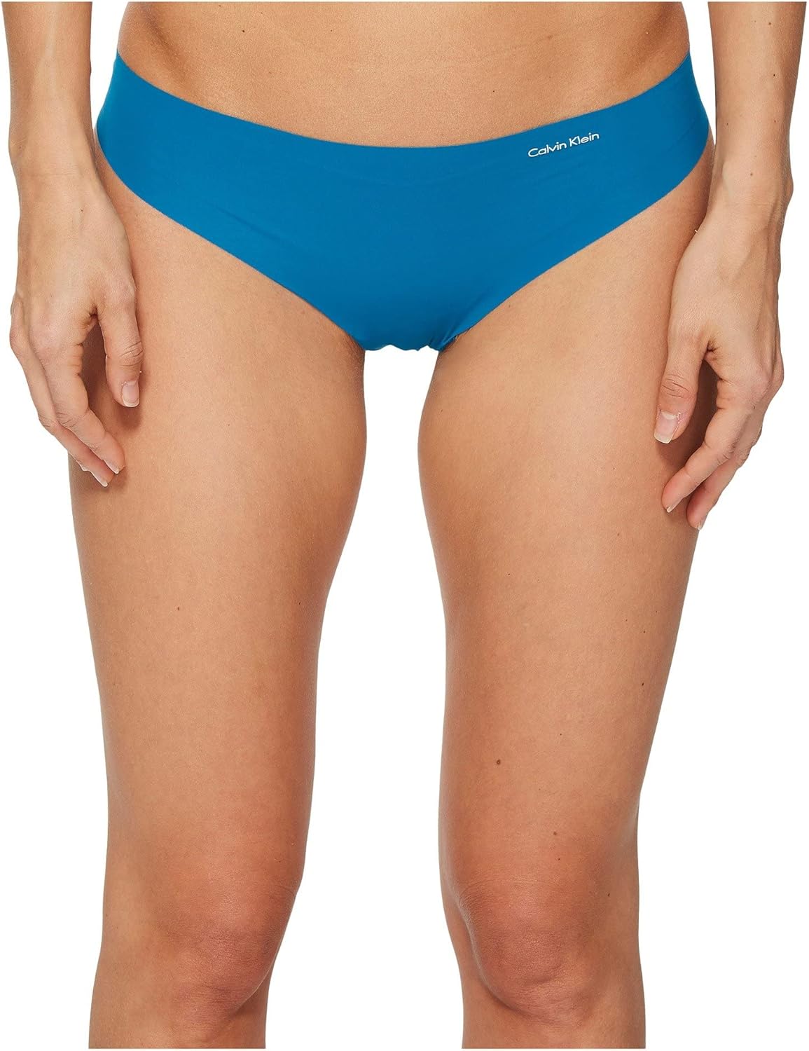 Комплект из 3 женских трусиков-стрингов Calvin Klein Invisibles, Cool Melon/Galaxy Grey/Field Olive — фото 2