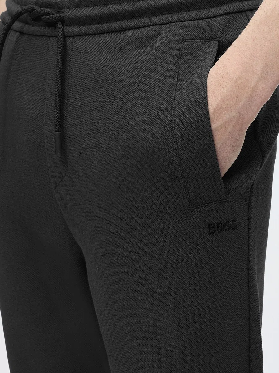 Спортивные брюки BOSS Tapered Workout Pants 'Union Hadiko' черного цвета — фото 3