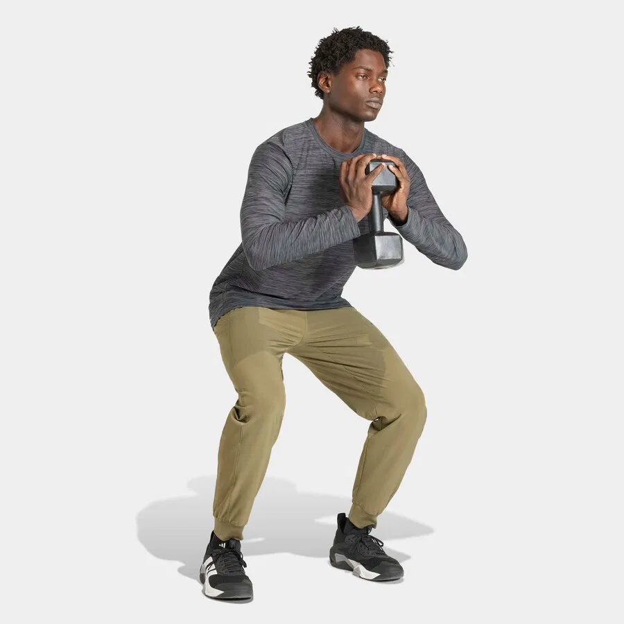 Спортивные шорты ADIDAS PERFORMANCE зауженного кроя, зеленые — фото 4