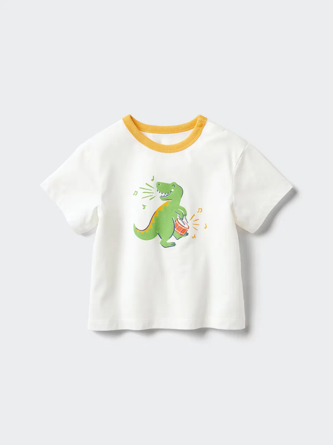 Футболка Uniqlo Airism, хлопковая, с принтом динозавра, желтый