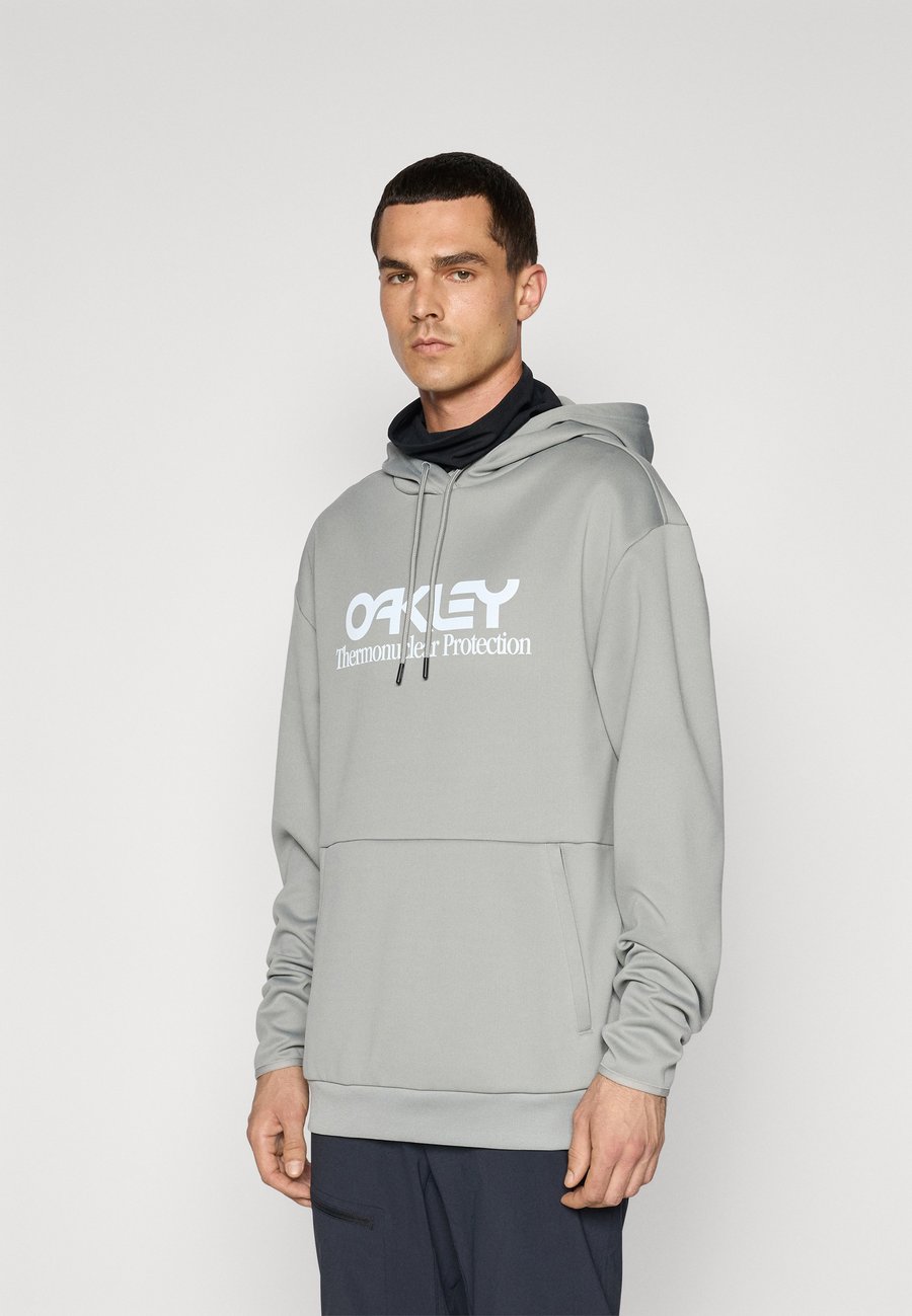 

Худи Oakley RIDER LONG HOODIE, Cement/Light Grey