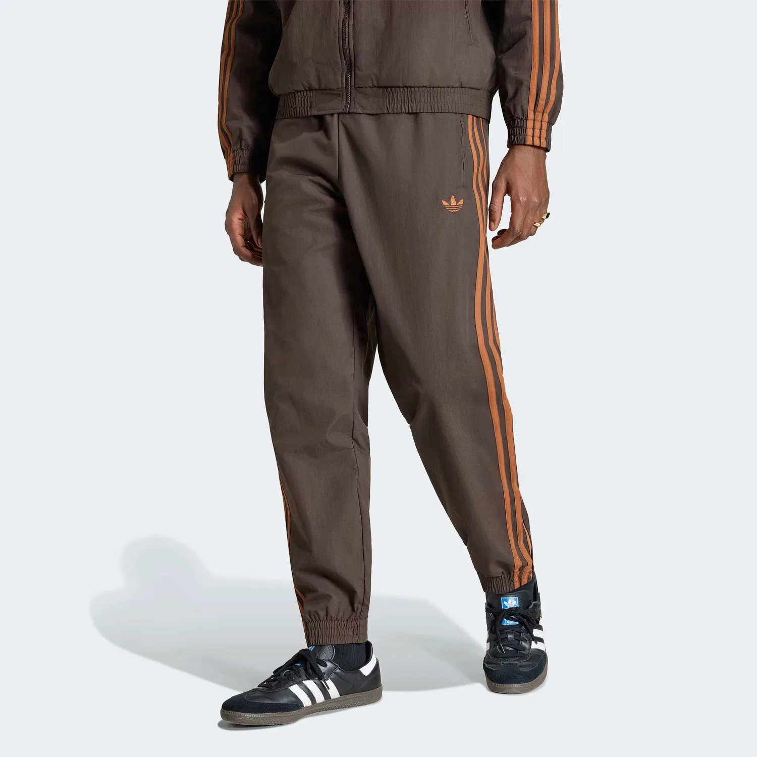 Зауженные брюки Adidas Originals Firebird коричневого цвета