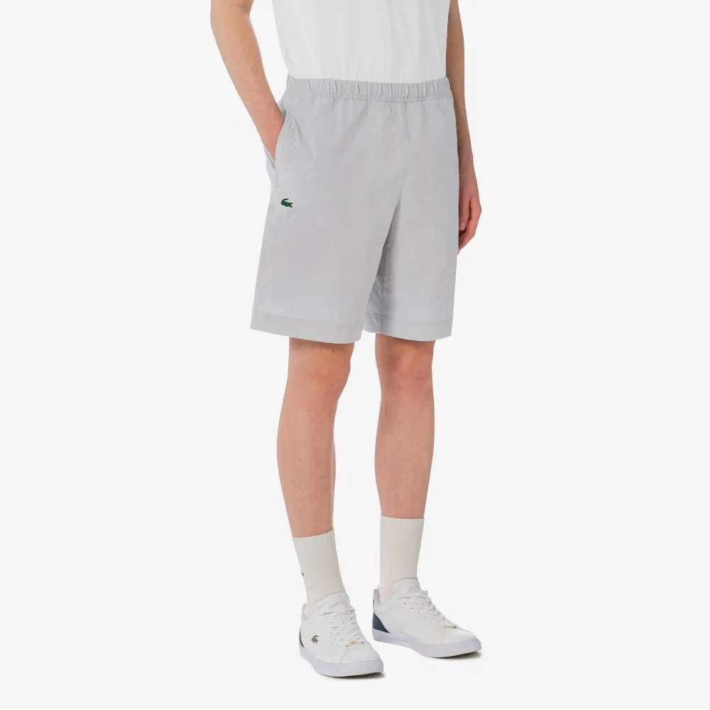 Мужские эластичные шорты из тканого материала светло-серые от Lacoste — фото 2