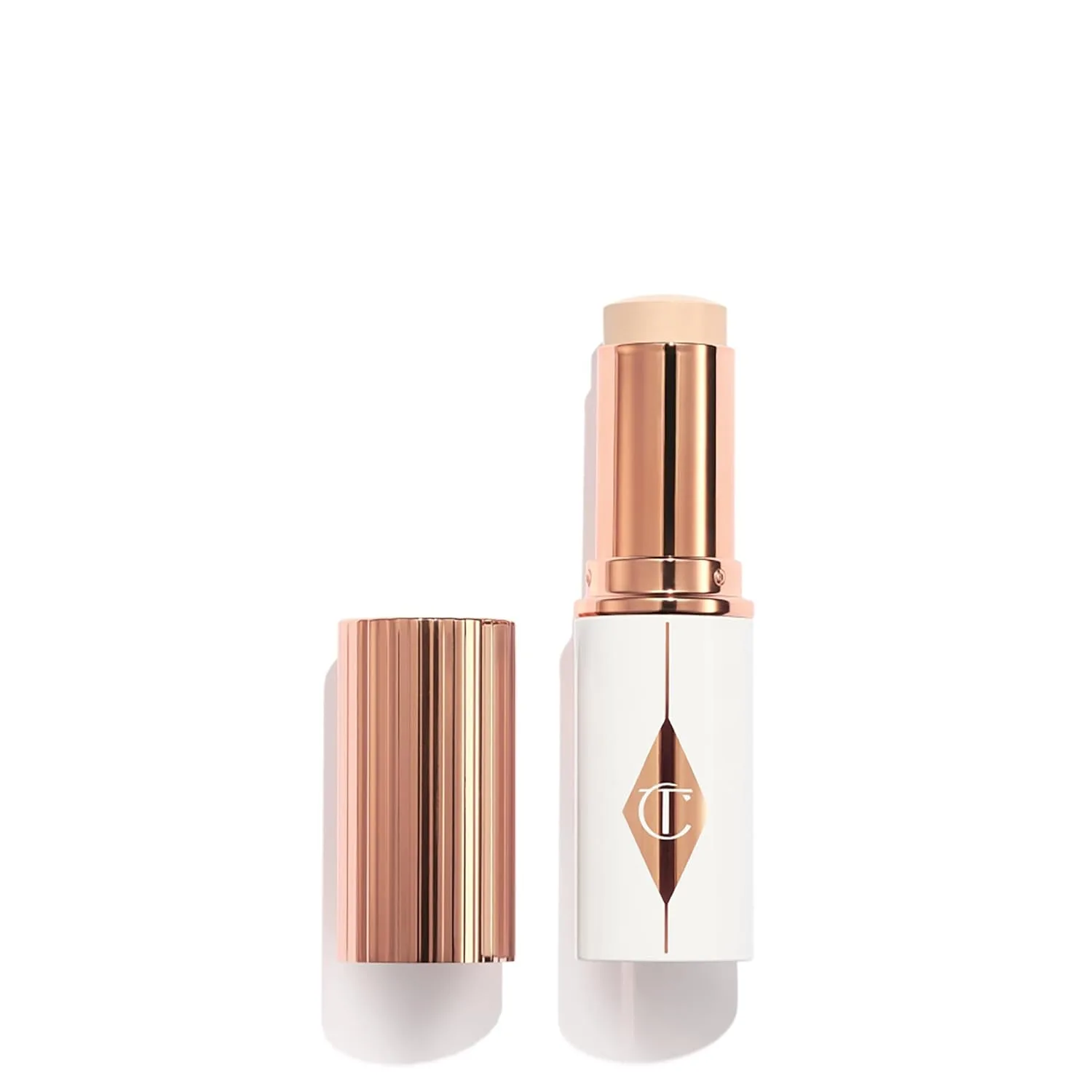Charlotte Tilbury Unreal Skin Tint & Sheer Glow Hydrating Foundation Stick - кремовая тональная основа с легким покрытием и увлажняющим эффектом, 01 Fair - Fairest with neutral undertones