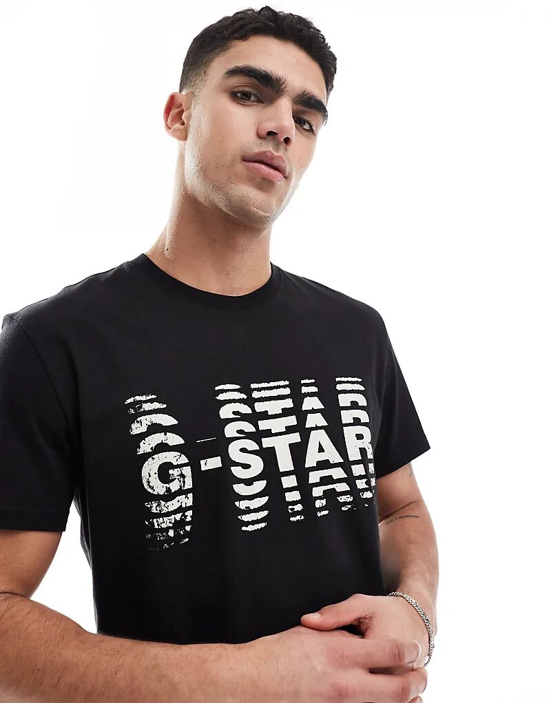 

Футболка черного цвета с принтом логотипа в виде рваных дыр G-Star
