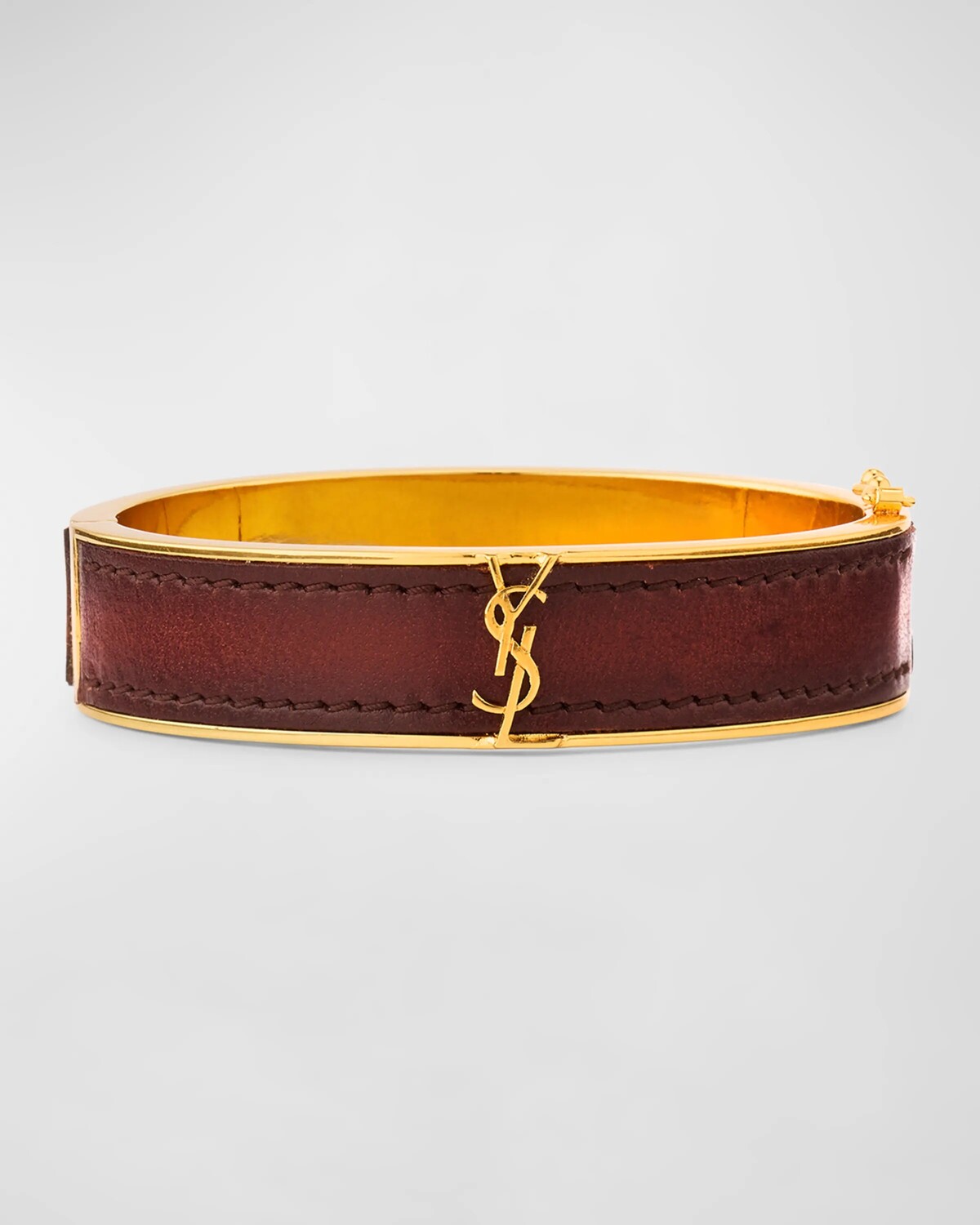 

Браслет YSL из кожи и латуни с монограммой Saint Laurent, цвет Cacao.Caca