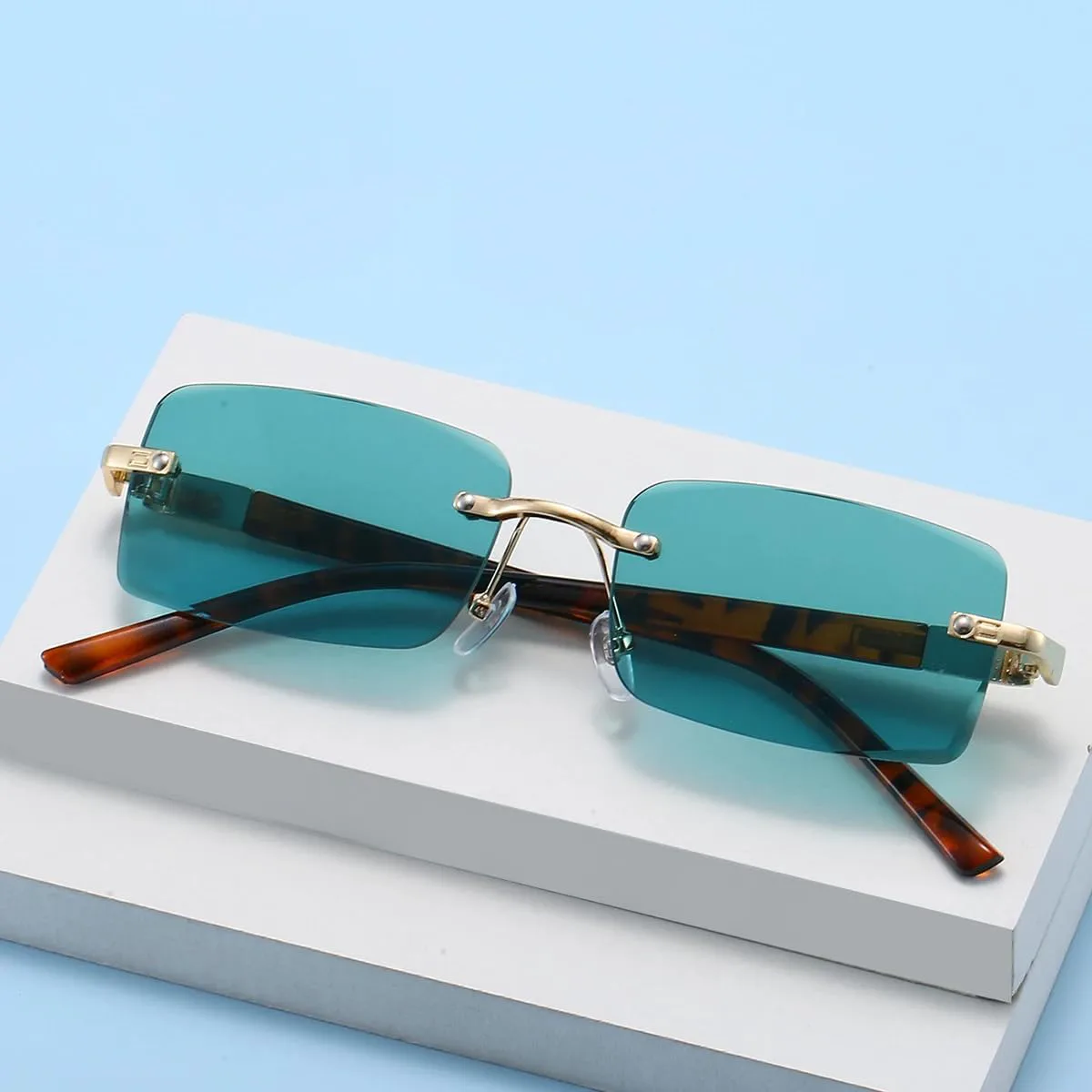 

Ретро солнцезащитные очки для мужчин, модные винтажные без оправы, женские солнцезащитные очки класса люкс, повседневные солнцезащитные очки SZVVBKK, Golden-blue