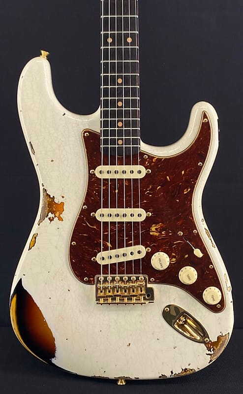 

Электрогитара Fender Custom Shop LTD Edition '62 Heavy Relic Strat in Aged Olympic White over 3-Color SB