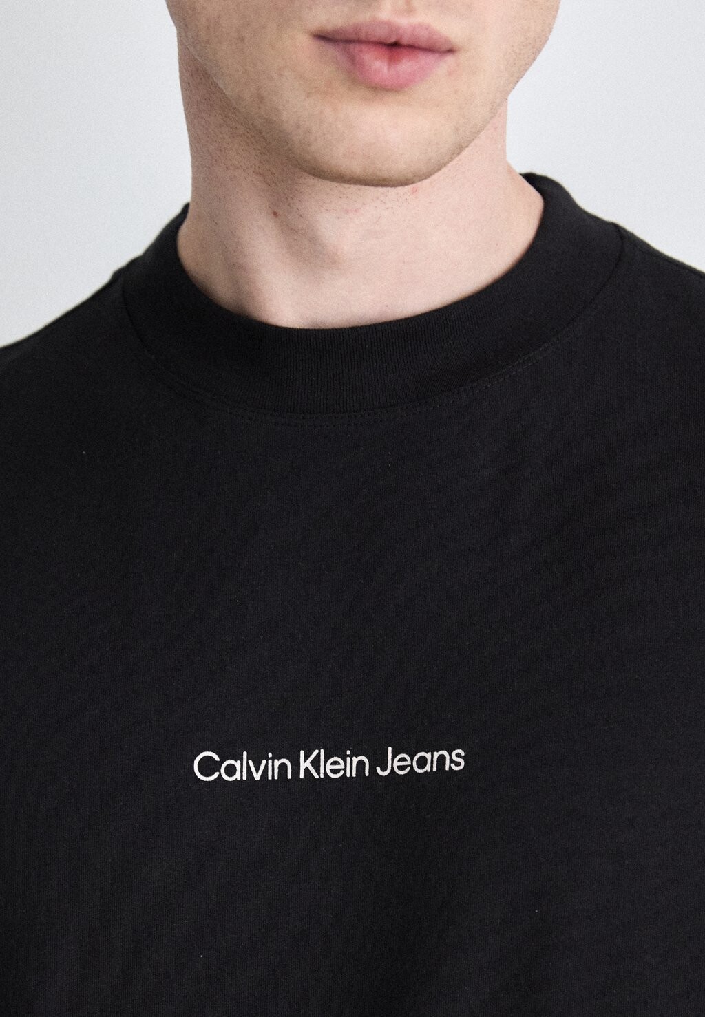 

Футболка с принтом GRID MONOGRAM TEE Calvin Klein, черный