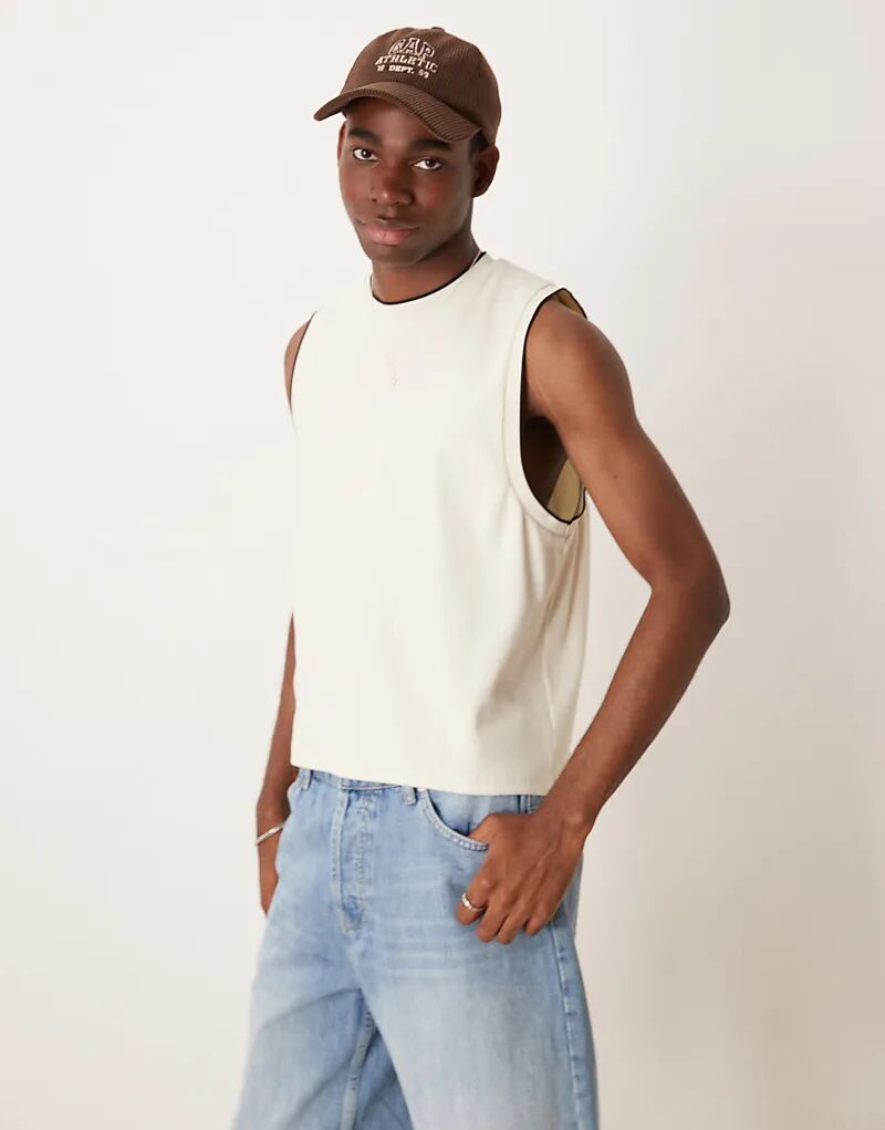 

Майка свободного кроя с круглым вырезом ASOS DESIGN в кремовый цвет рубчика
