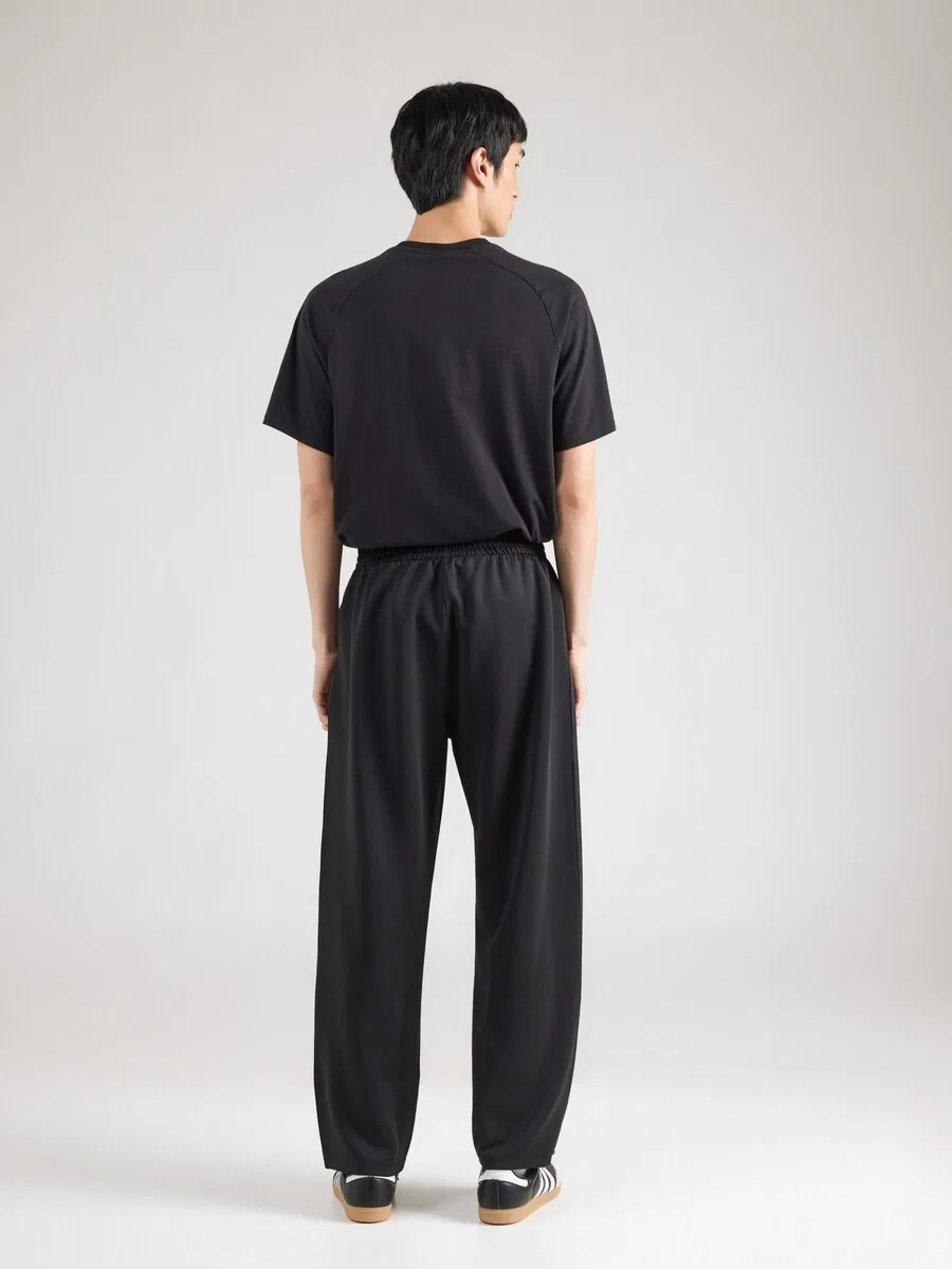 Брюки ADIDAS ORIGINALS свободного кроя 'ESSENTIALS' черного цвета — фото 4