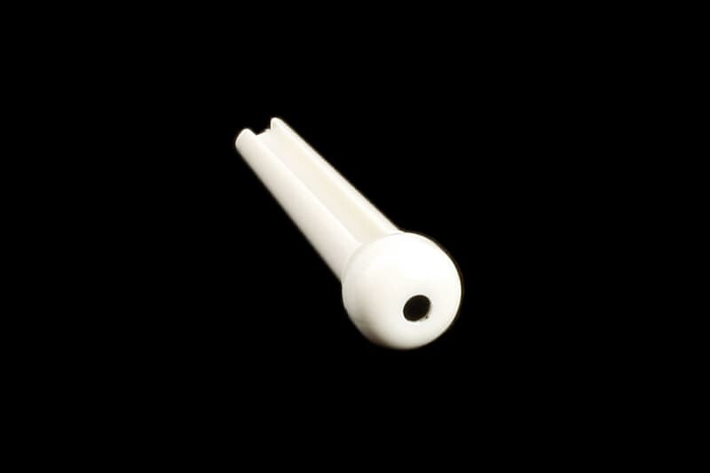 

Белые пластиковые гитарные бриджевые штифты, черная точка - 50 шт. Allparts BP-0678-025