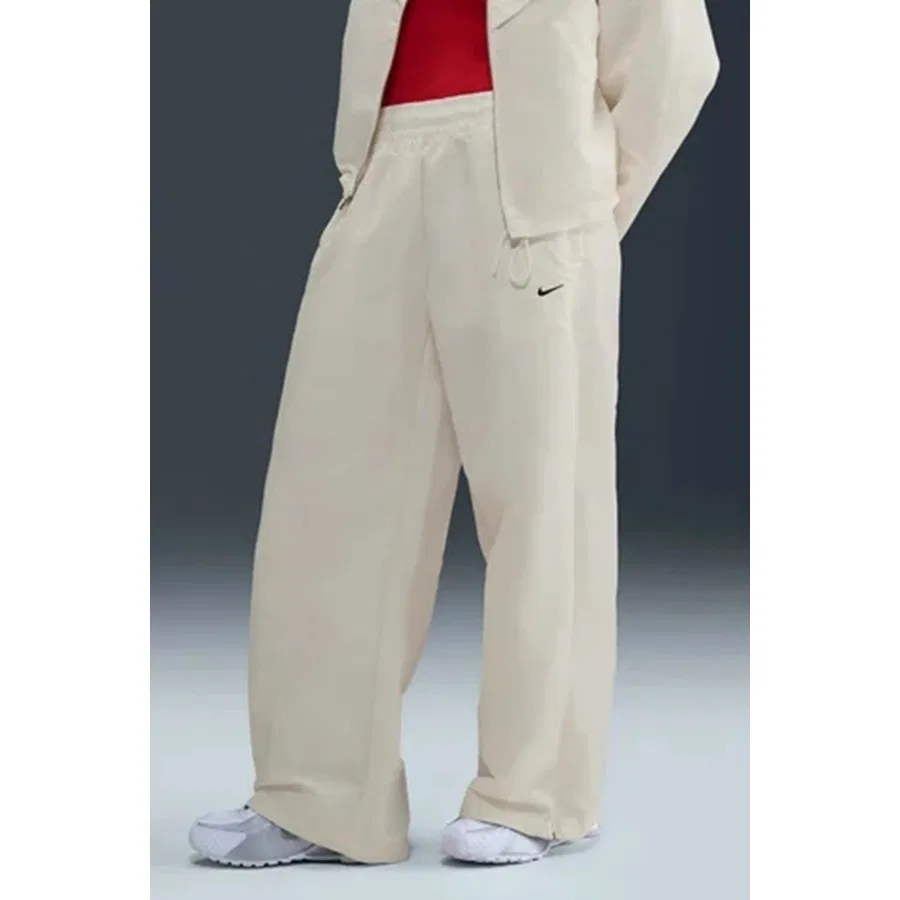 Спортивные брюки с молниями по низу Nike Sportswear Windrunner Women's Shine Trousers, Кремовый