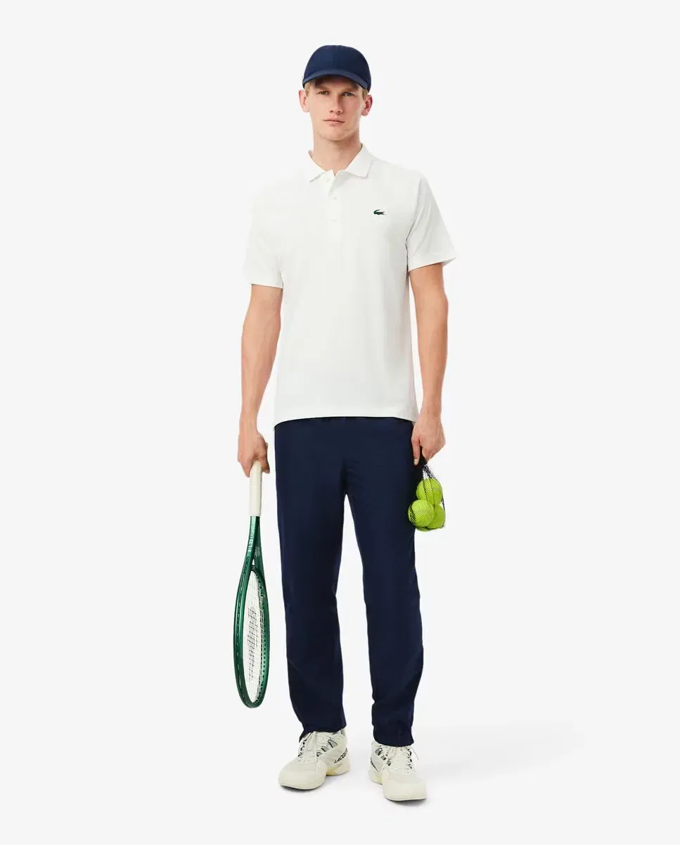 Мужские спортивные брюки-джоггеры из полиэстера French Capsule Negro Lacoste, Azul Oscuro — фото 4